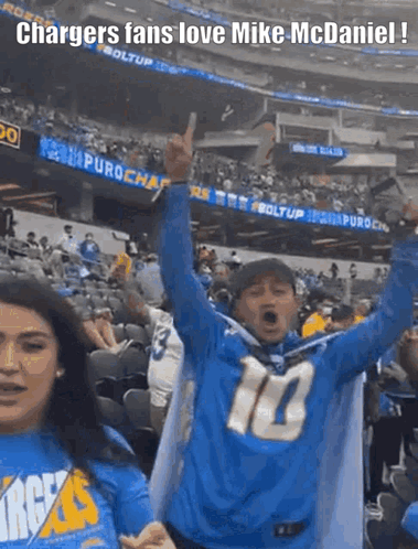 Man In Number 10 Jersey In Crowd GIF