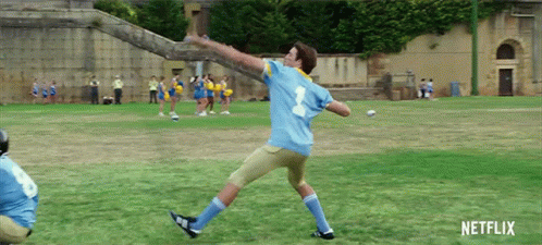 Man in Number 2 Shirt Throwing Soccer Ball