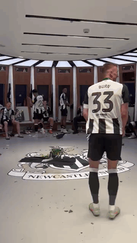 Man in Number 33 Jersey Newcastle Locker Room