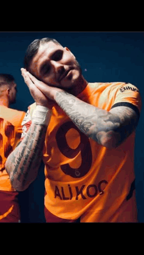 Man in Number 9 Ali Koc Jersey