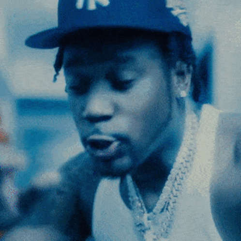 Man In NY Hat And White Tank Top GIF