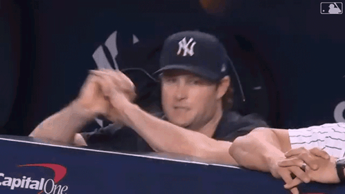 Man in NY Hat Thumbs Up to Fan