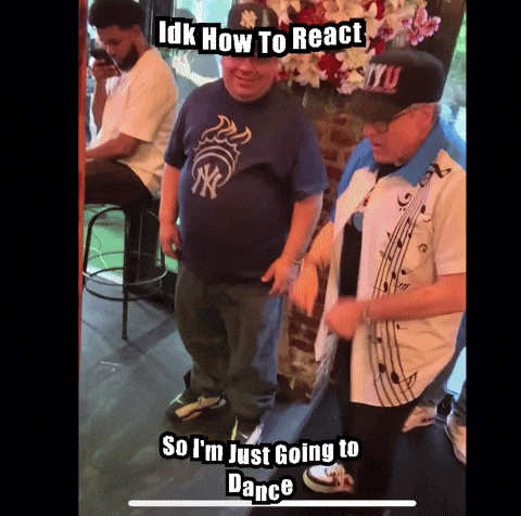 Man In NY Yankees Shirt Dancing With Man GIF