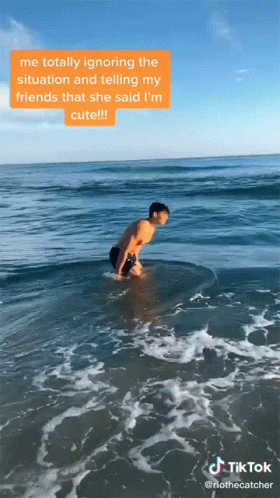 Man in Ocean Me Totally Ignoring