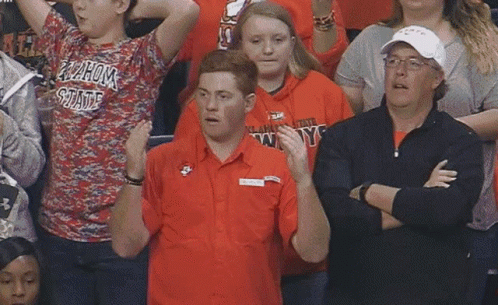 Man in Oklahoma State Shirt in Crowd