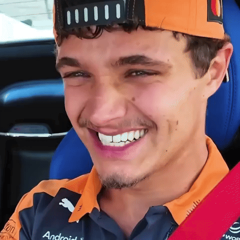 Man in Orange Hat and Android Shirt Smiling