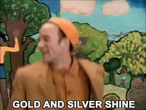 Man In Orange Hat Dancing In Front Of Painting Saying Gold And Silver Shine GIF