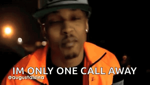 Man in Orange Jacket and Hat Saying I'm Only One Call Away