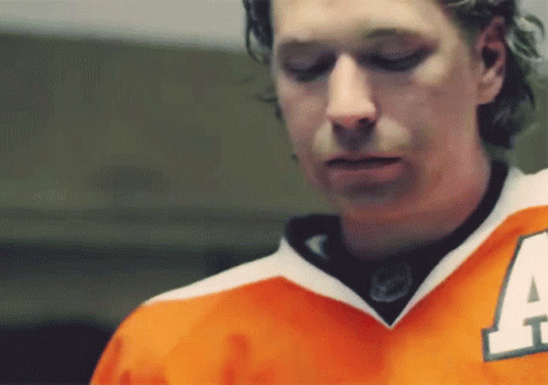 Man in Orange Jersey Number 4