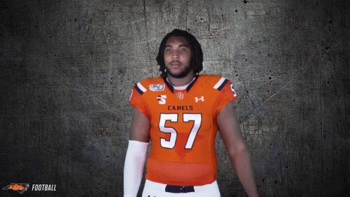 Man In Orange Jersey Number 57 GIF