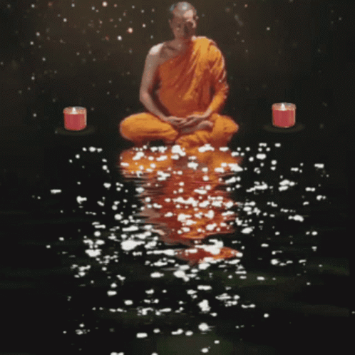 Man in Orange Robe Sitting Lotus