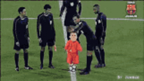 Man in Orange Shirt and Blue Jersey 10
