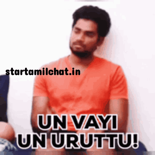 Man In Orange Shirt Arms Crossed Un Vayi Un Urttu GIF