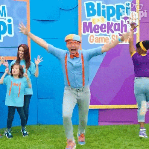 Man in Orange Shirt Dancing Near Pool