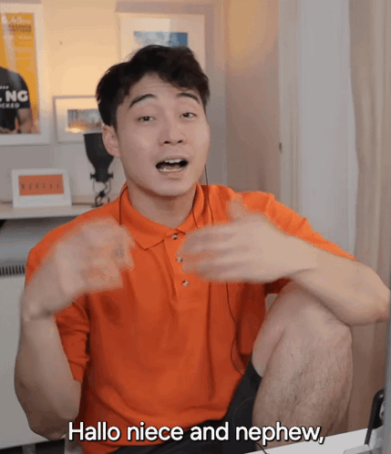 Man in Orange Shirt Saying Hallo Niece and Nephew