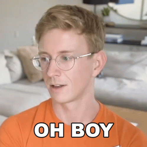 Man in Orange Shirt Saying Oh Boy