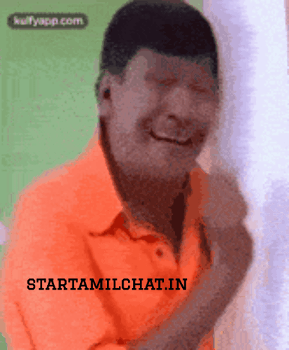 Man In Orange Shirt Smiling GIF
