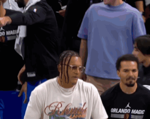 Man in Orlando Magic T-Shirt