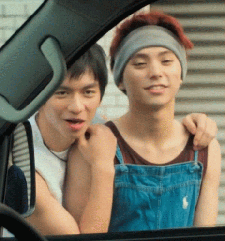 Man In Overalls Hugging Another Man GIF