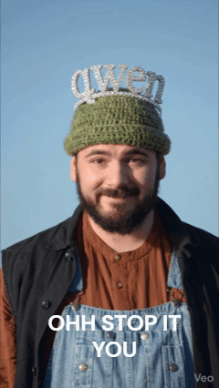Man In Overalls With Crown Saying Gwen GIF