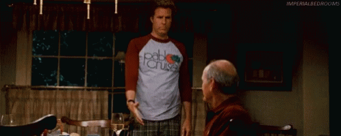 Man In Pablo Cruise Shirt Next To Older Man GIF