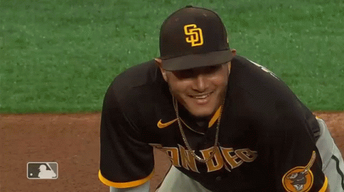 Man in Padres Baseball Uniform Smiling