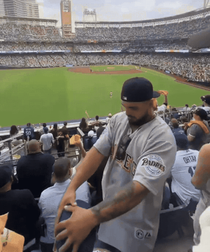 Man in Padres Jersey in Stadium