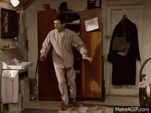Man In Pajamas Jumping GIF