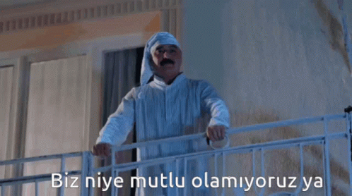 Man In Pajamas On Balcony Biz Niye Mutlu Olamiyoruz Ya GIF