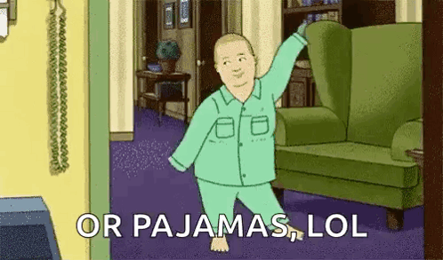 Man in Pajamas Standing in Front of Couch