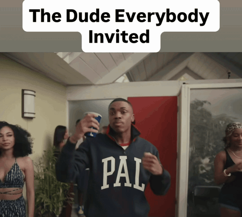Man in Pale Sweatshirt Holding Cup