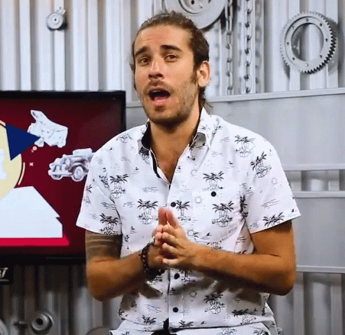 Man in Palm Tree Shirt Making Funny Face
