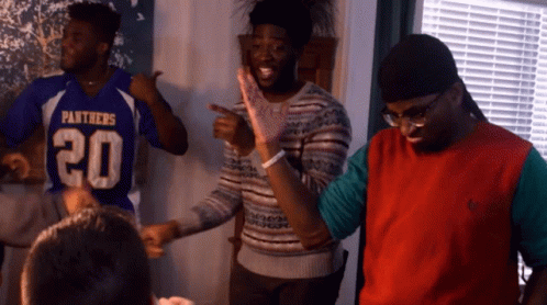 Man In Panthers Jersey Dancing With Two Men GIF