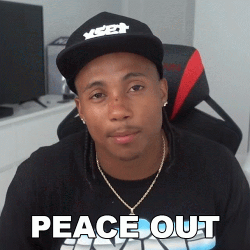 Man in Peace Out Shirt and Hat