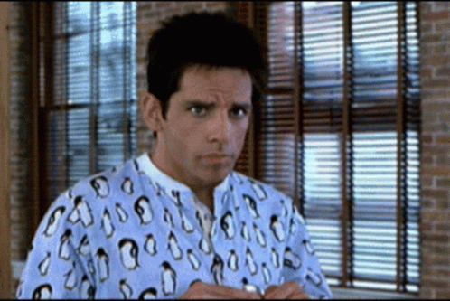 Man in Penguin Shirt Standing