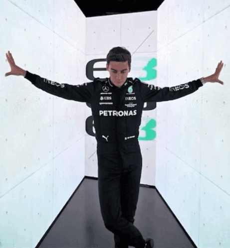 Man in Petronas Jacket in Hallway