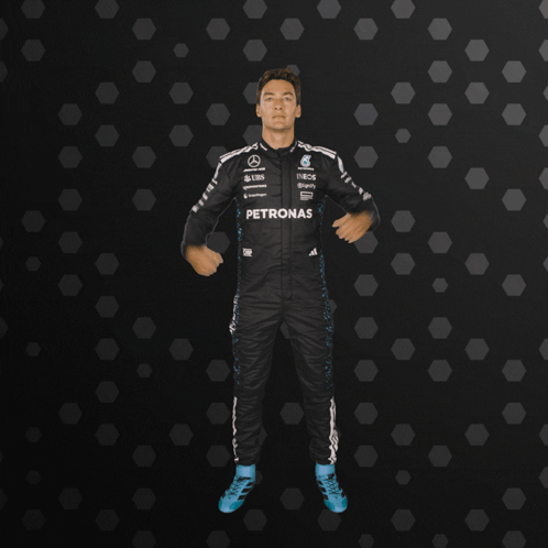 Man in Petronas Jumpsuit Dancing
