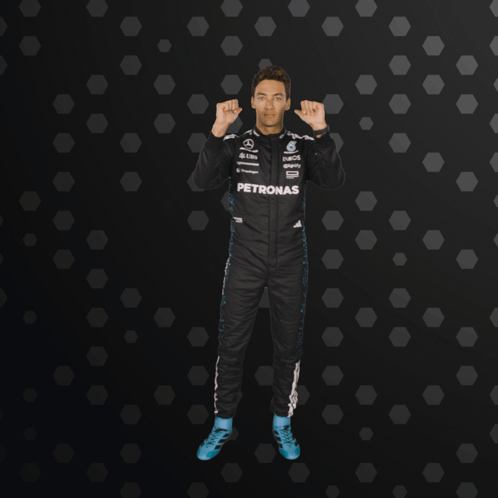 Man in Petronas Racing Suit Giving Thumbs Up