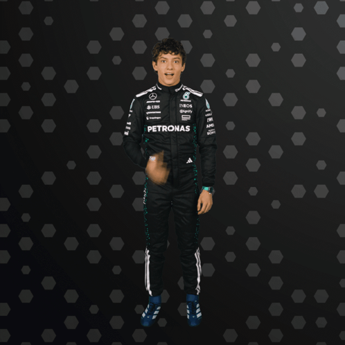 Man in Petronas Suit Fist Up