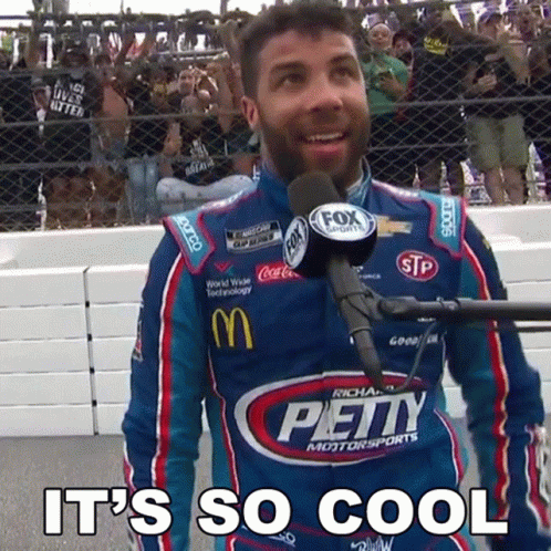 Man in Petty Motorsports Shirt at Microphone