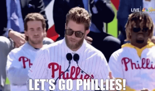 Man in Phillies Jersey at Microphones