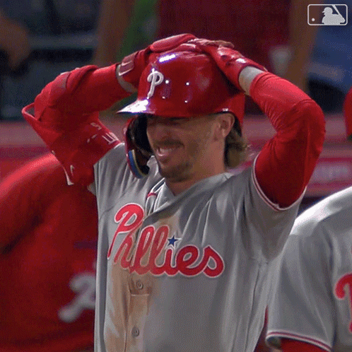 Man in Phillies Uniform Hands Behind Head