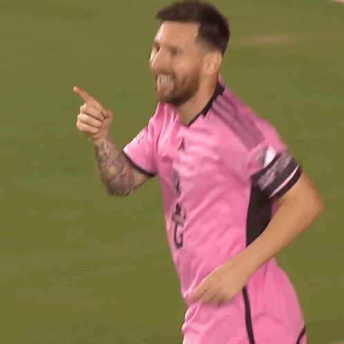 Man in Pink Adidas Jersey Giving Thumbs Up