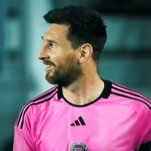 Man In Pink Adidas Shirt Smiles GIF