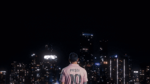 Man in Pink Adidas Shirt with Arms Crossed