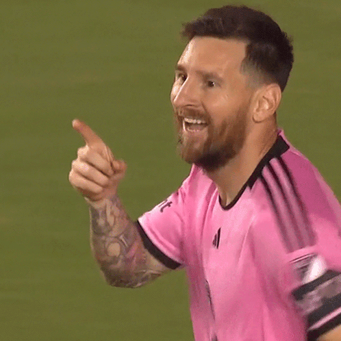 Man in Pink Adidas Shirt with Crown