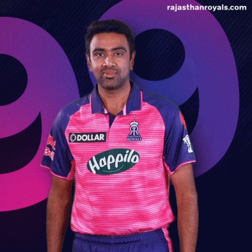 Man in Pink and Blue Shirt With Dollar Logo