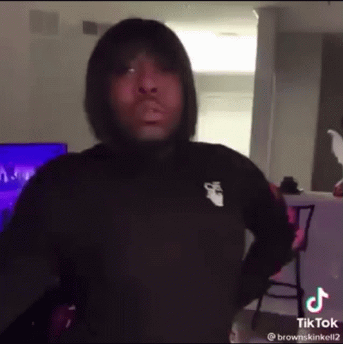 Man in Pink Bandana and Black Jacket