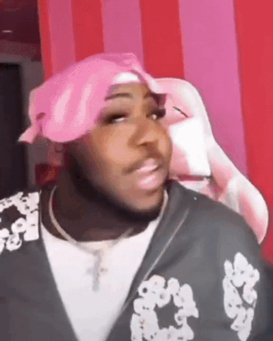 Man in Pink Bandana and Black Jacket