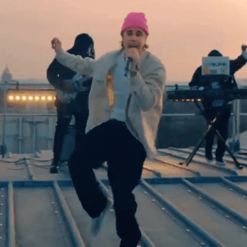 Man In Pink Beanie Singing GIF
